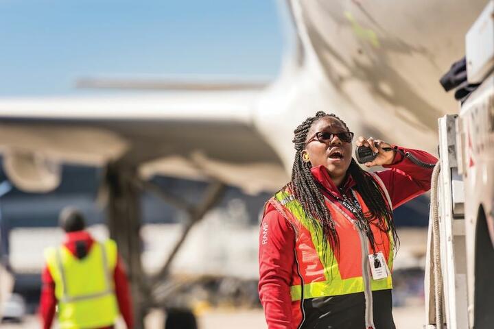 A Delta employee working on the ramps.